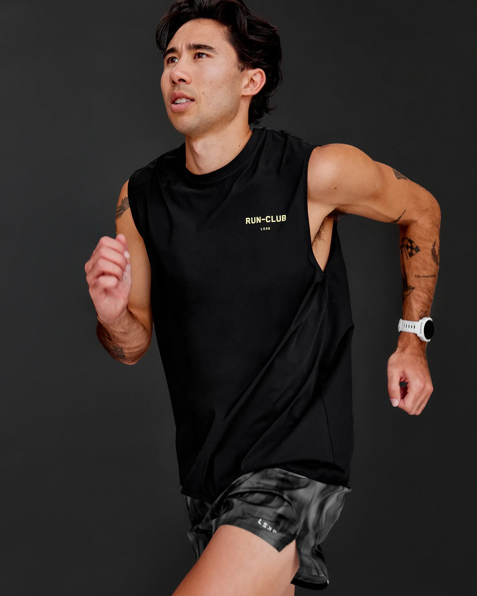 cadence-run-club-muscle-tank-yXShAOQh-0.webp Outlet LSKD Cadence RUN CLUB Muscle Tank Black Yellow Fizz